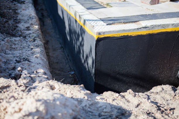 Professional Waterproofing technician working in New London, MN